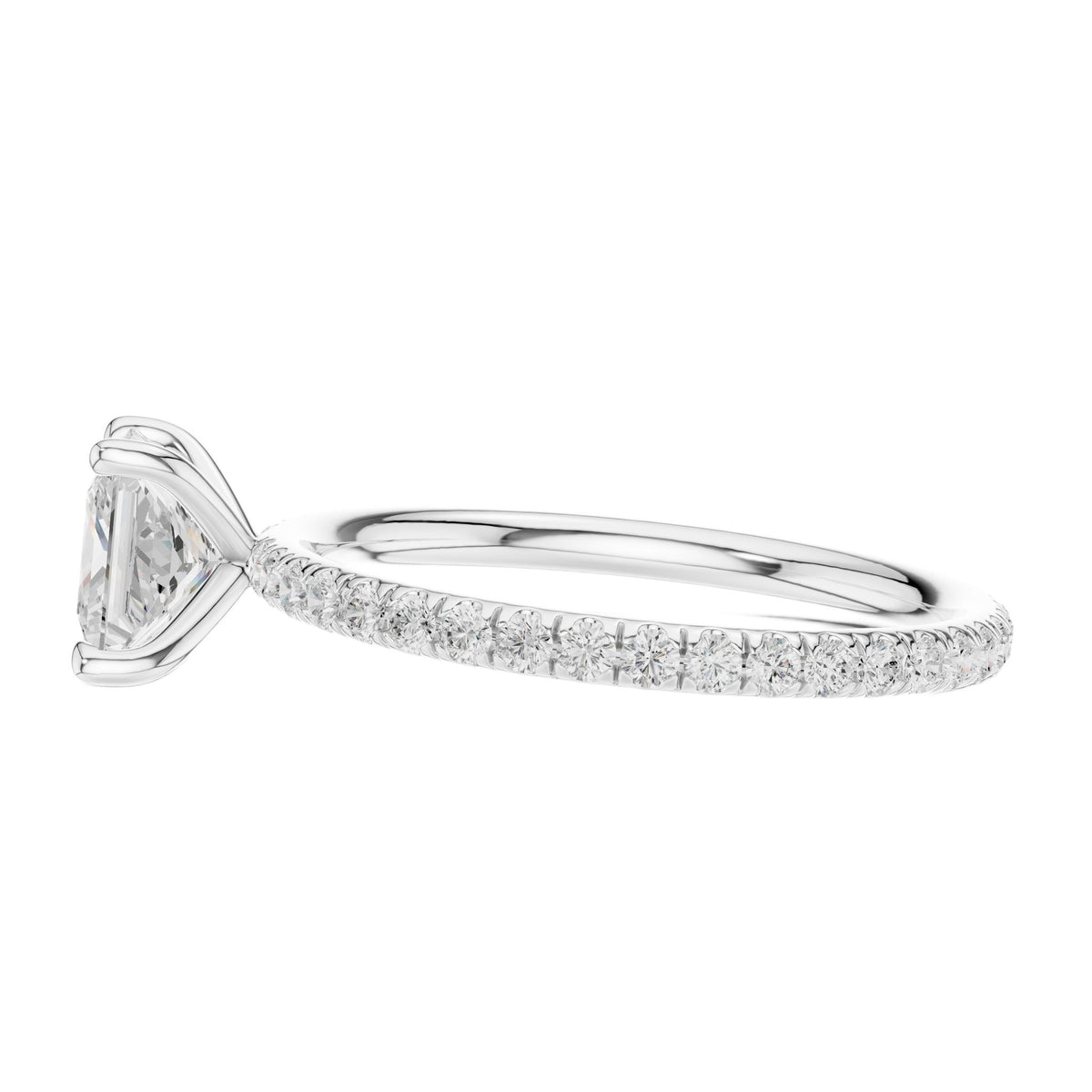White gold princess-cut solitaire diamond ring with pavé band, side view, four-prong setting