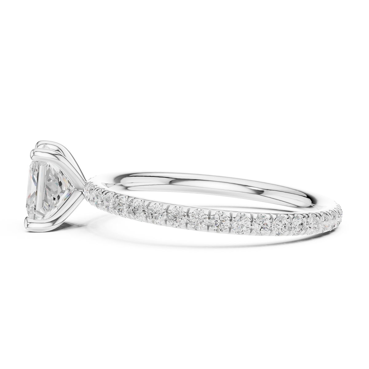 White gold princess-cut solitaire diamond ring with pavé band, side view, four-prong setting