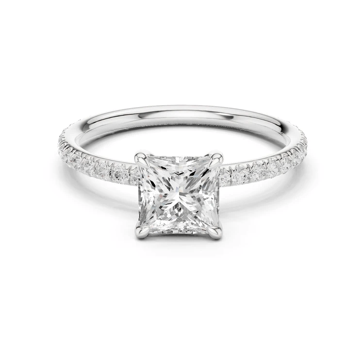 White gold princess-cut solitaire diamond ring with pavé band and four-prong center setting