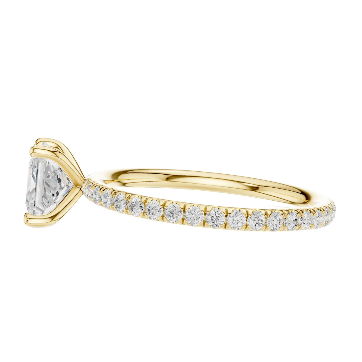 Yellow gold princess-cut solitaire diamond ring with pavé band, side view, four-prong setting