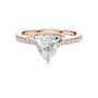 Triangular diamond accent ring, rose gold band with pavé stones and triangular center stone front view
