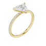 Yellow gold diamond ring with faceted center stone and pavé side halo, 3/4 view