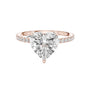 Rose gold heart-cut diamond ring with pavé band and heart-shaped center stone