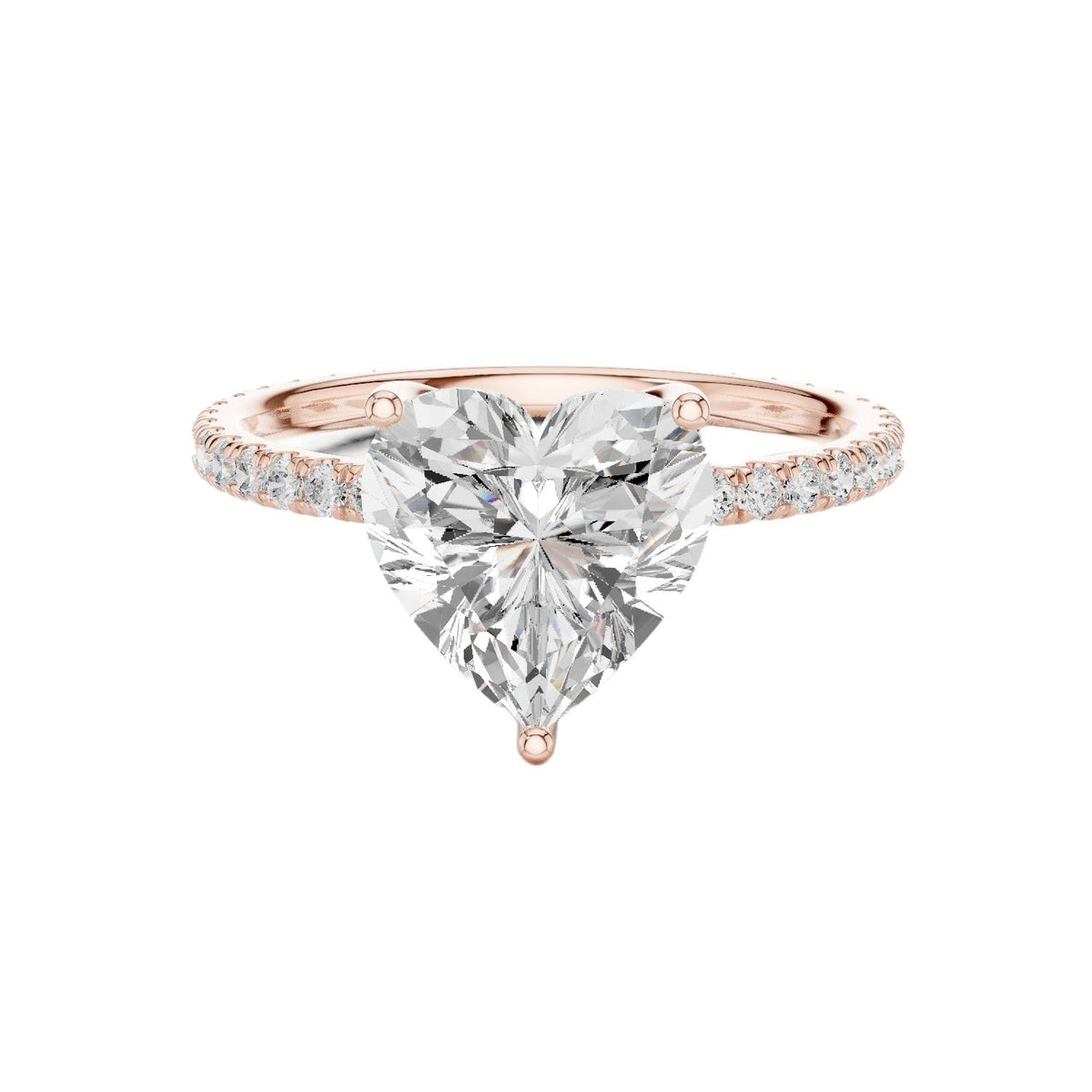 Rose gold heart-cut diamond ring with pavé band and heart-shaped center stone