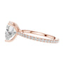 Rose gold heart-cut diamond ring with pavé band and prong-set heart center stone