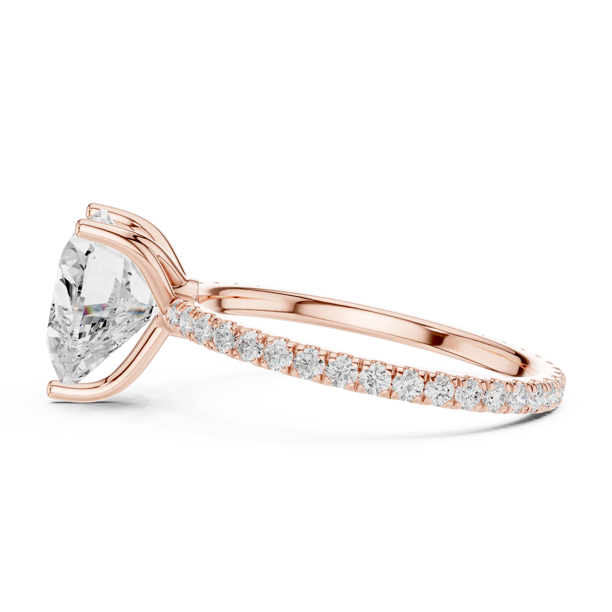 Rose gold heart-cut diamond ring with pavé band and prong-set heart center stone