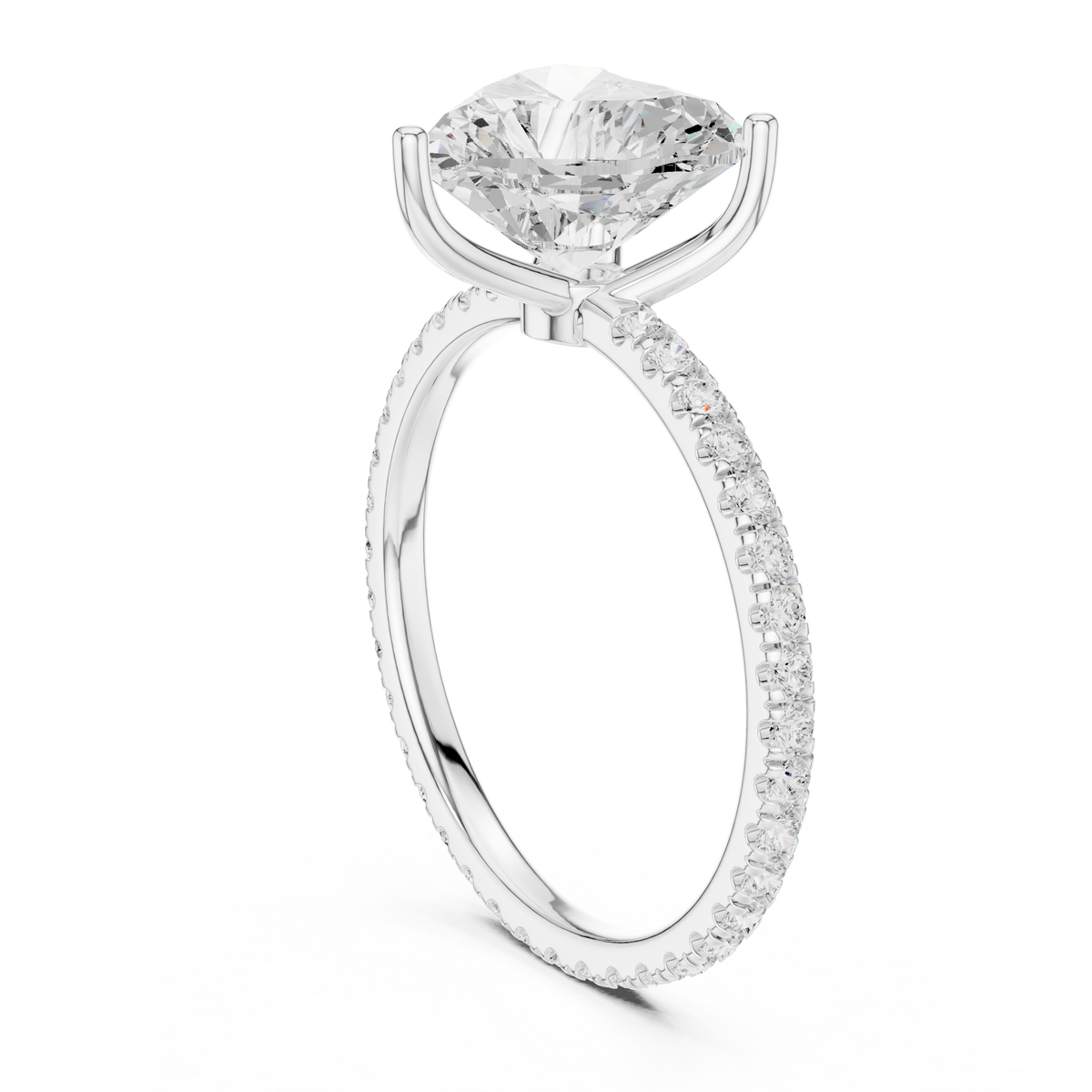 White gold heart-cut diamond ring with pavé side stones and heart-shaped center
