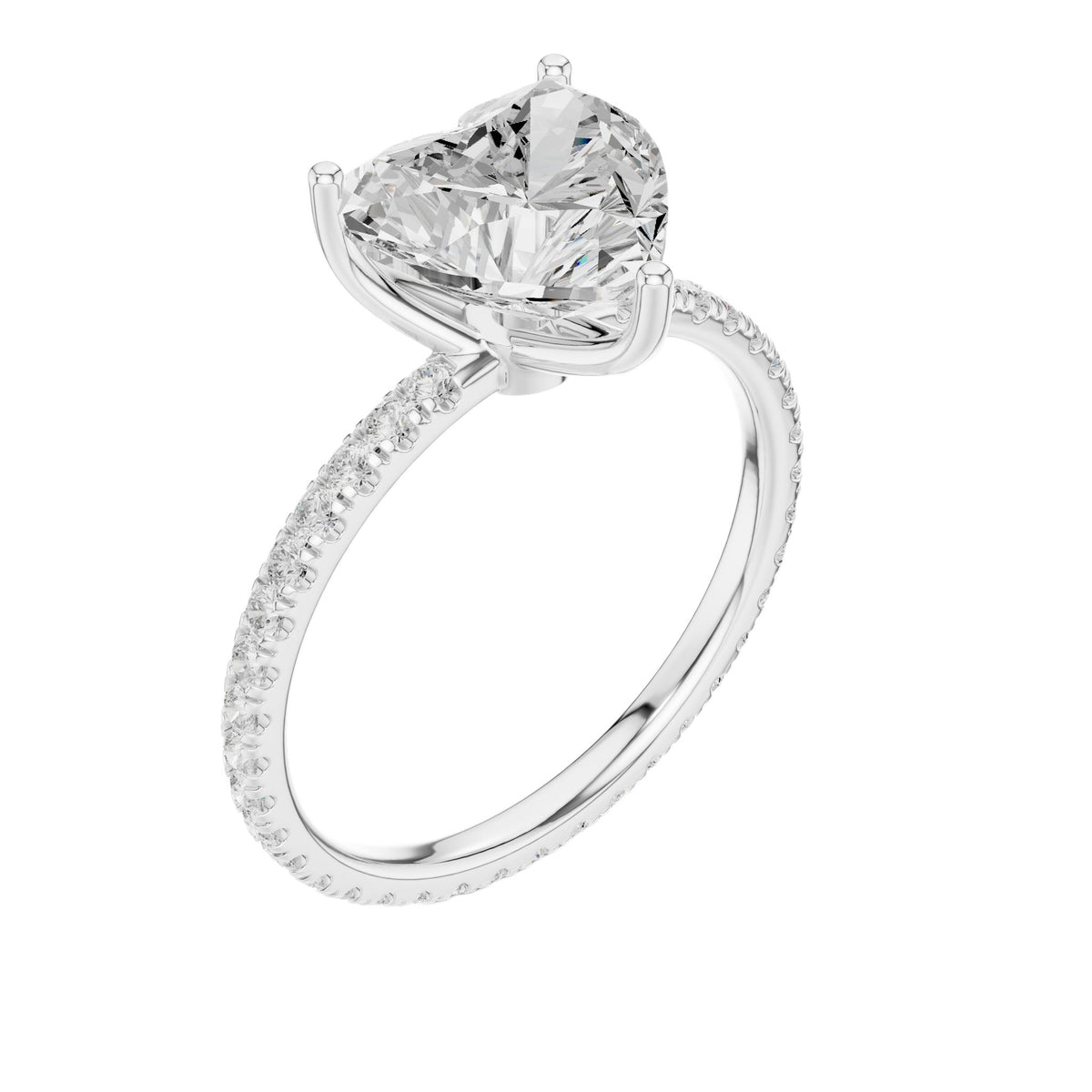 White gold heart-cut diamond ring with pavé band and prong-set heart center, angle view