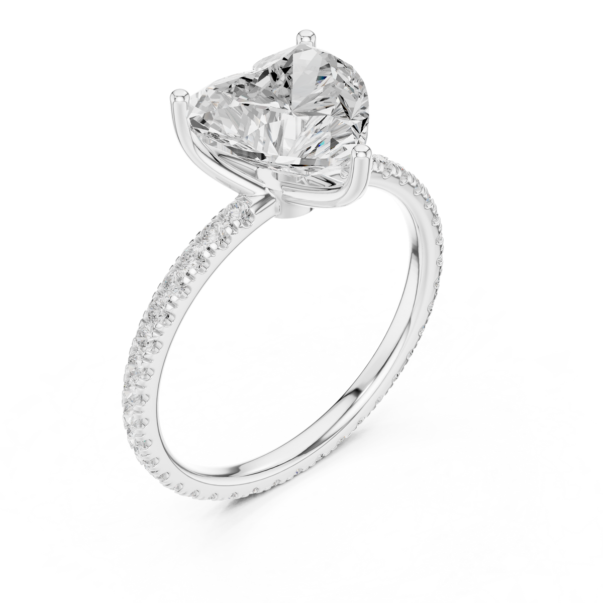 White gold heart-cut diamond ring with pavé band and prong-set heart center, angle view