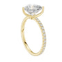 Heart cut pavé diamond ring with heart-shaped center stone and pavé side band