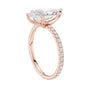 Marquise pavé diamond ring in rose gold with marquise center stone and diamond band