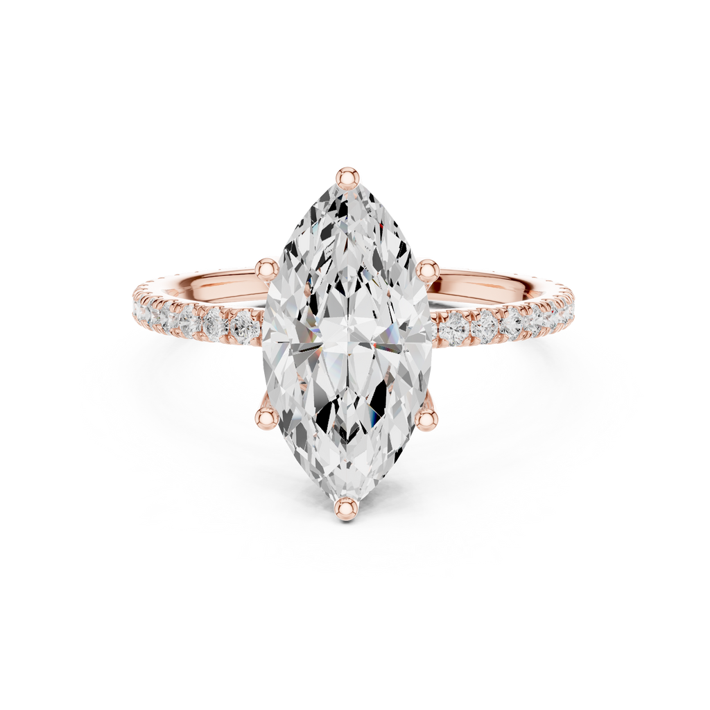 Rose gold pear-shaped gemstone ring with pave band and prong setting