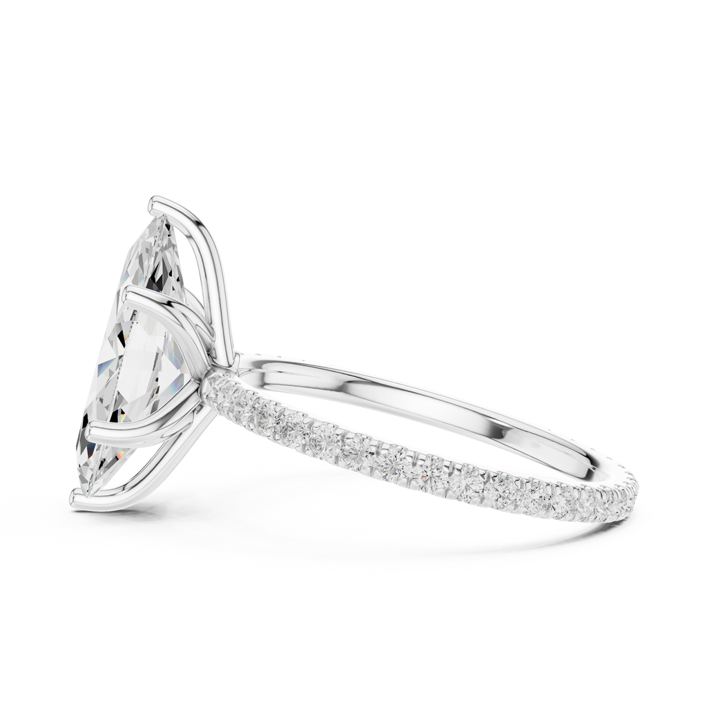 Silver-tone gemstone ring with prong-set pear-cut center and pavé band