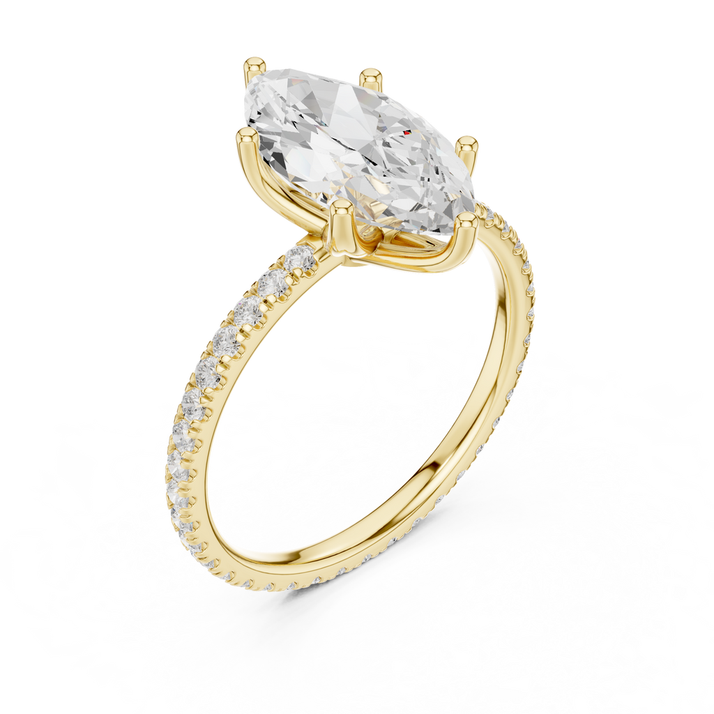 Gold-tone pear-cut gemstone ring with pavé shoulders and curved band