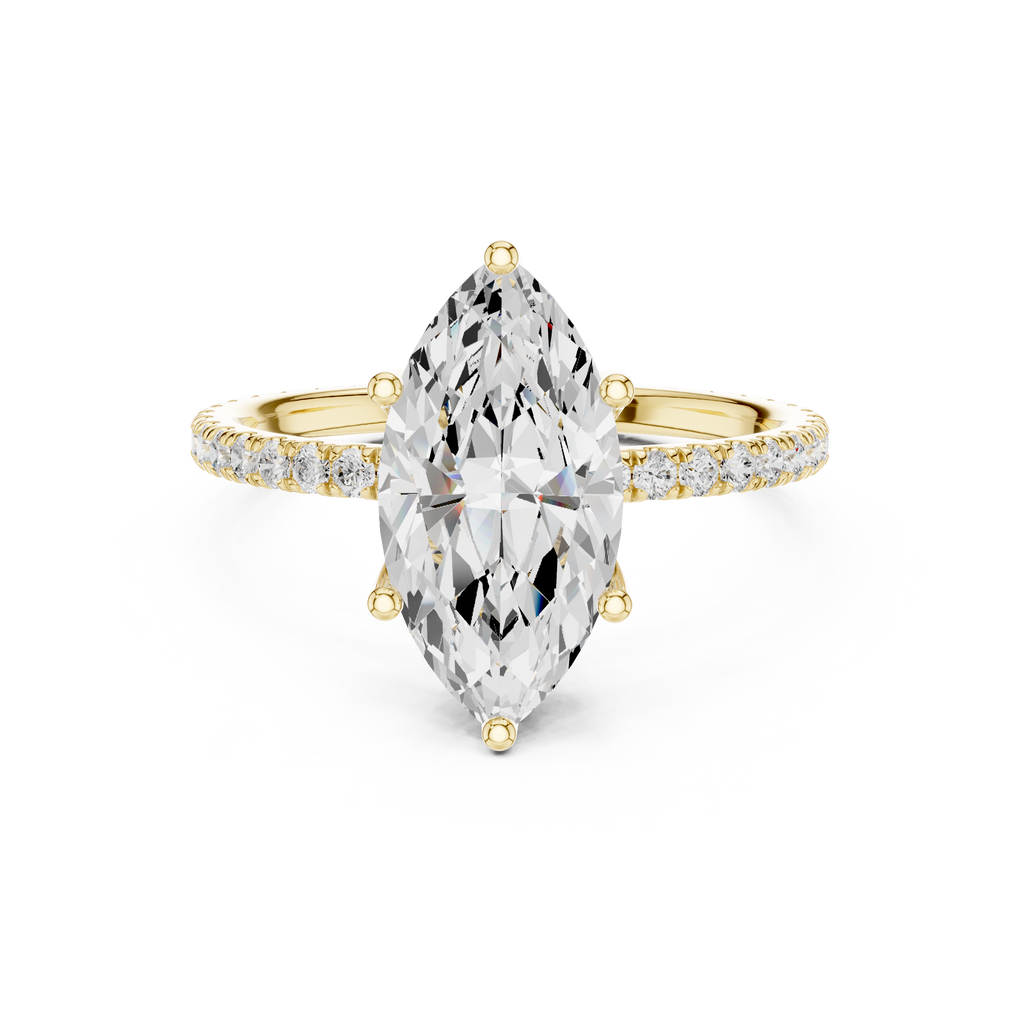 Gold-tone gemstone ring with pear-cut center stone and pavé halo on band