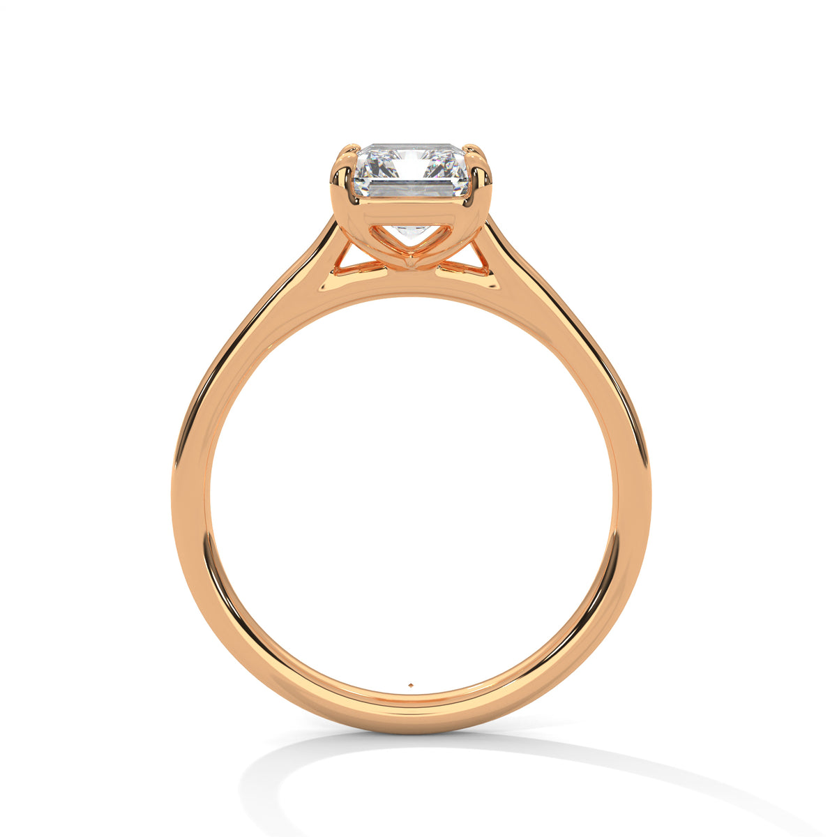 Rose gold solitaire engagement ring with emerald-cut center stone and trellis prongs