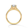 Rose gold solitaire engagement ring with emerald-cut center stone, trellis-style setting