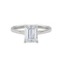 Platinum solitaire engagement ring with emerald-cut center stone in four-prong trellis setting