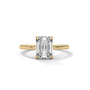 Diamond solitaire ring with emerald-cut center stone and four-prong setting, yellow gold