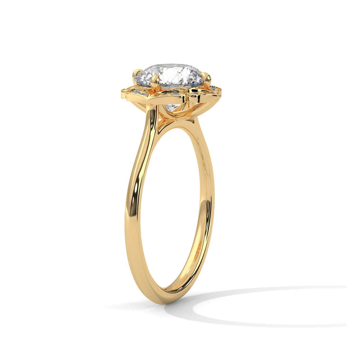 Yellow gold engagement ring with round center stone and floral halo, side view.