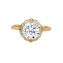 Yellow gold round halo engagement ring with prong-set center stone, 3/4 view.