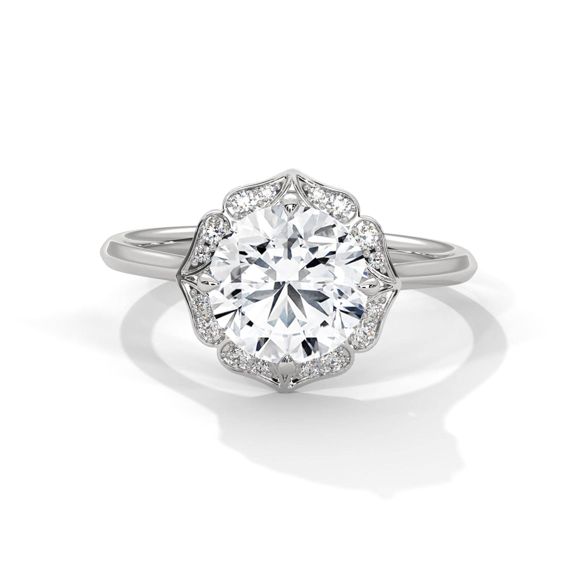 White gold round halo engagement ring with prong-set center stone, 3/4 view.