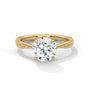 Twisted solitaire diamond ring in yellow gold with round center diamond