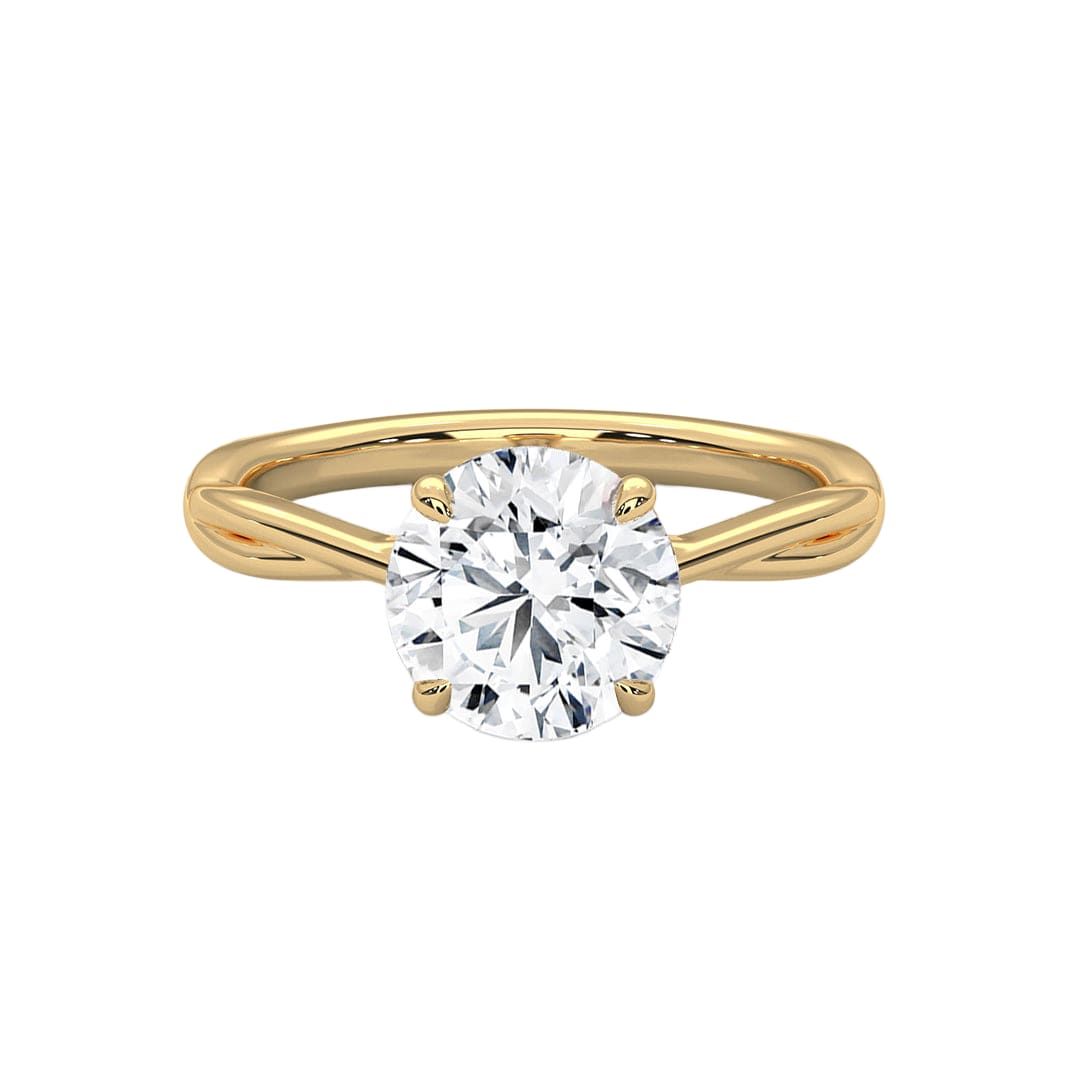 Twisted solitaire diamond ring in yellow gold with round center diamond