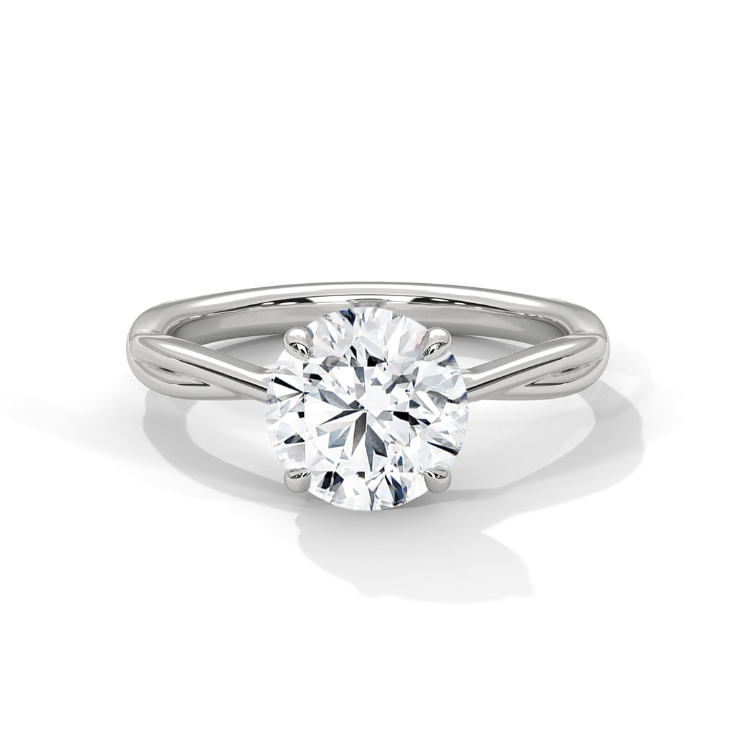 Twisted solitaire diamond ring in white gold with round center diamond