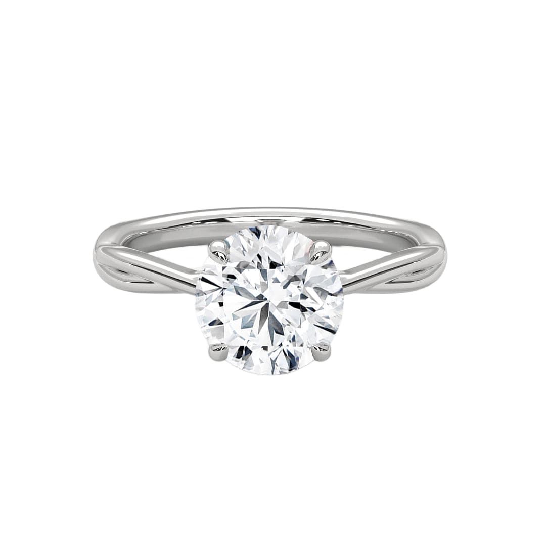 Twisted solitaire diamond ring in white gold with round center diamond