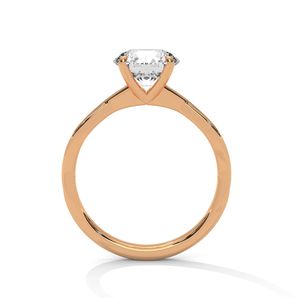 Twisted solitaire diamond ring in yellow gold with round center stone