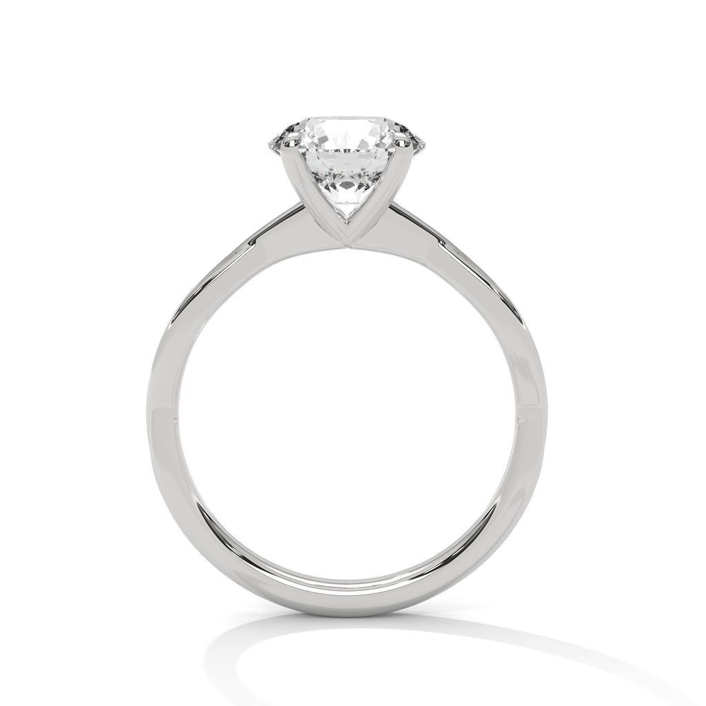 Silver solitaire ring with clear gemstone in prong setting and slim round band