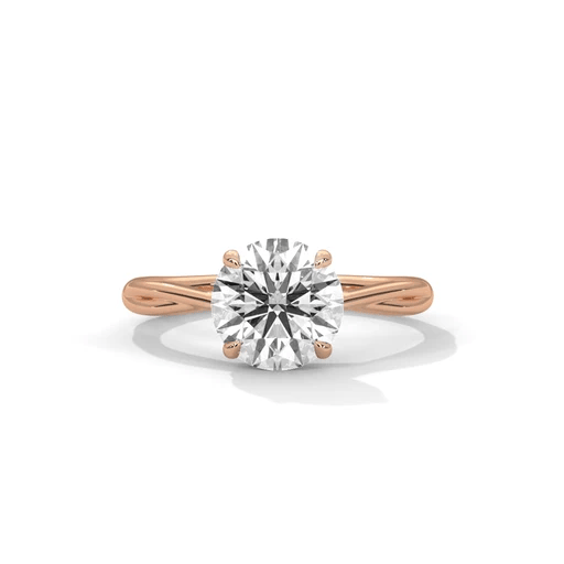 Rose gold twisted solitaire diamond ring with round center stone